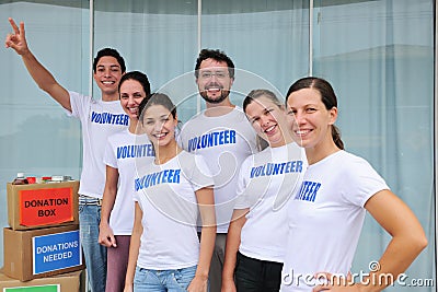 Happy volunteer group with food donation Stock Photo