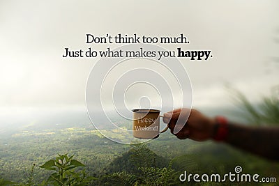 Happy Weekend inspirational quote - Don`t think too much. Just do what make you happy. Hand of person holding a cup of coffee. Stock Photo