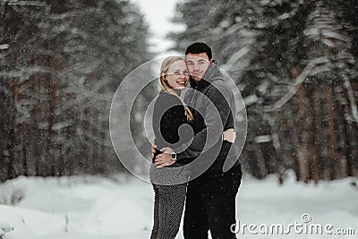 Happy winter travel couple Stock Photo