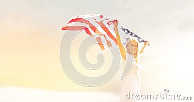 Happy woman with american flag outdoors Stock Photo