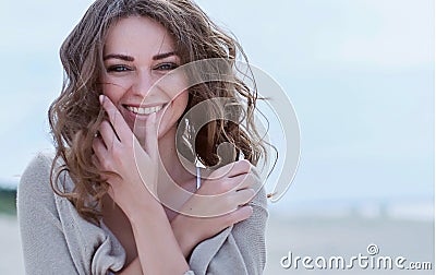 Happy woman on the beach. Stock Photo