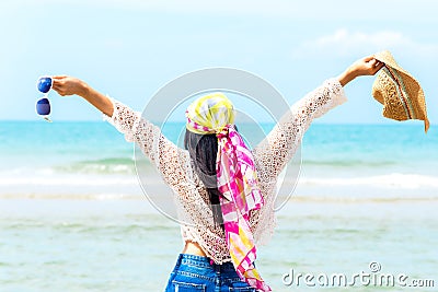 Happy woman on the beach Stock Photo