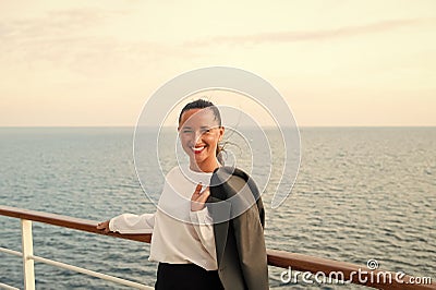 Happy woman with business jacket on shipboard in miami, usa. Travelling for business. Sensual woman smile on ship board Stock Photo