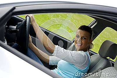 Happy Woman in the car Stock Photo