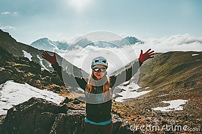 Happy Woman climber on summit mountain Stock Photo