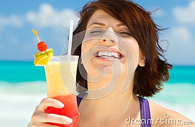 Happy woman with colorful cocktail Stock Photo