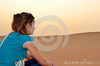 Happy woman in desert Stock Photo