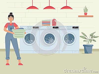 Happy woman doing laundry. Woman holding backet with clean clothes. Housework, laundry service. Washing clothes. Stock Photo