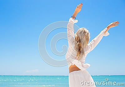 Happy woman enjoying hot summer day Stock Photo