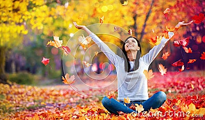 Happy Woman Enjoying Life in the Autumn Stock Photo