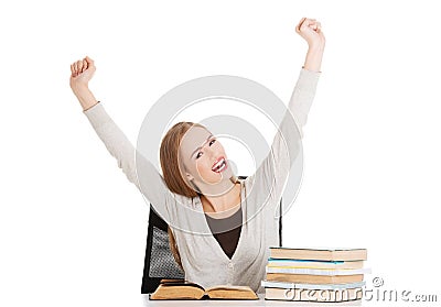 Happy woman finished preparing to exam Stock Photo