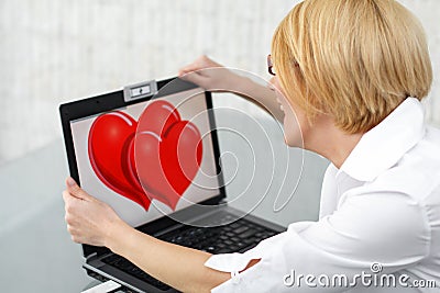 Happy woman flirt online Stock Photo