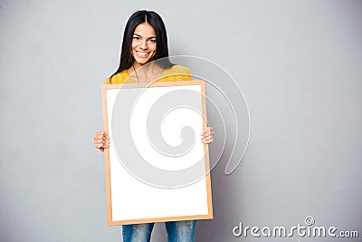 Happy woman holding blank board Stock Photo