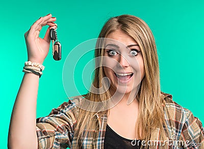 Happy woman holding car keys Stock Photo