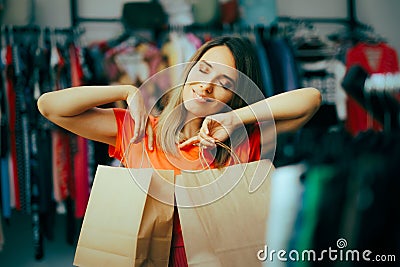 Happy Woman Holding Shopping Bags Feeling Excited Stock Photo