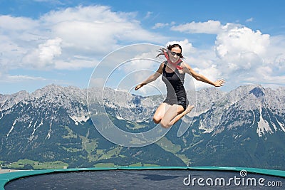 Happy woman jumping Stock Photo