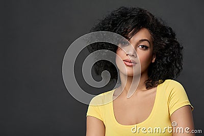 Confident mixed race woman looking at camera Stock Photo