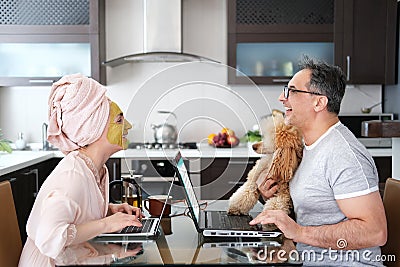 The happy woman and man are working remotely. Stock Photo