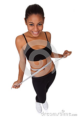 Happy Woman With Measure Tape Stock Photo