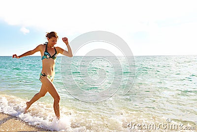 Happy woman on Miami beach. Stock Photo