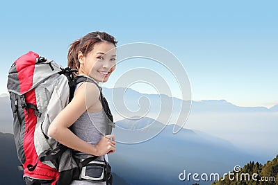 Happy woman mountain hiker Stock Photo