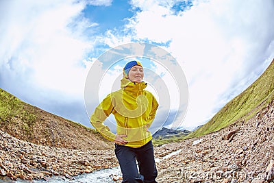 Happy woman in the mountains, Iceland Stock Photo