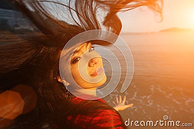 Happy woman ocean hair Stock Photo