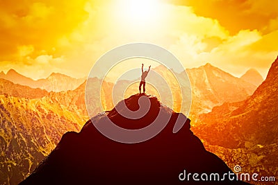 Happy woman on peak of the mountain enjoying the success, freedom and bright future. Stock Photo