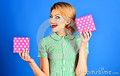 Happy woman with perfect makeup with gifts boxes. Celebrating birthday. Womens or mothers day. Stock Photo