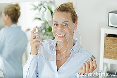 Happy woman with perfum Stock Photo