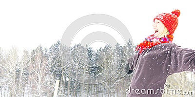 Happy Woman in the Red Hat Enjoys Winter. Copy Space Stock Photo