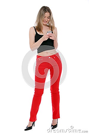 Happy woman sending a text message Stock Photo