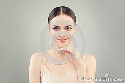 Happy woman spa model with clear skin portrait. Spa, wellness, cosmetology and facial treatment Stock Photo