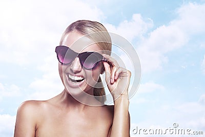 Happy woman in sunglasses Stock Photo