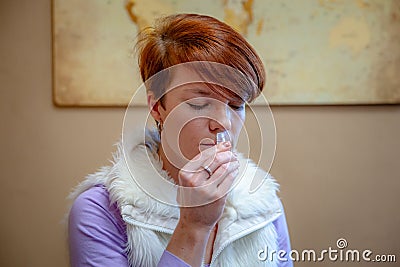 woman tests and recognizes the smell on lectures about natural smells Stock Photo