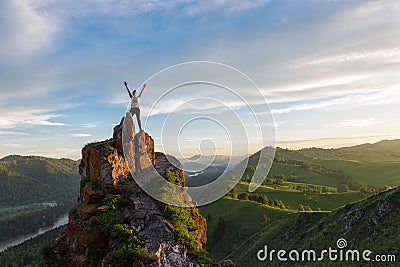 Happy woman on top mountain Stock Photo