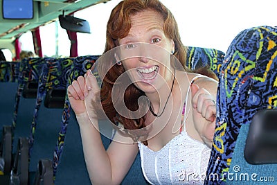 Happy woman tourist traveling bus indoor Stock Photo