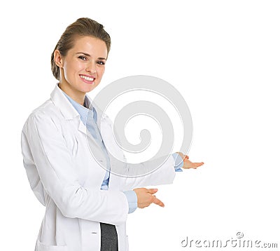 Happy woman in white robe inviting Stock Photo