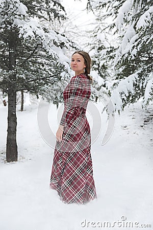 Happy woman in winter with snow Stock Photo