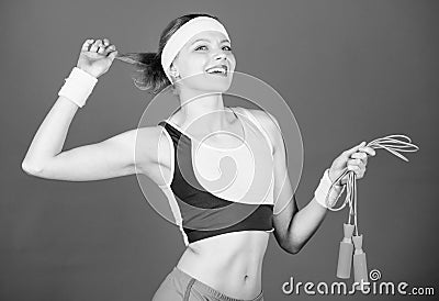 Happy woman workout with jump rope. Sporty woman training in gym. Health diet. Shaping success. Strong muscles and power Stock Photo