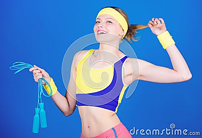 Happy woman workout with jump rope. Sporty woman training in gym. Health diet. Shaping success. Strong muscles and power Stock Photo