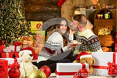 Happy woman and man. Christmas time. Celebrate new year at home. Winter shopping sales. Holiday gift. Holiday mood Stock Photo