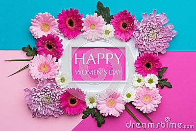 Happy Women`s Day Pastel Candy Colours Background. Floral flat lay. Stock Photo