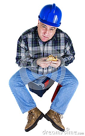 Happy worker eating a hamburger Stock Photo