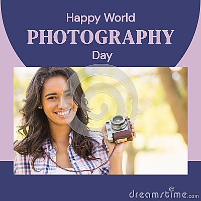 Happy world photography day text in purple with happy biracial woman holding camera in park Stock Photo