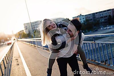 Happy young attractive couple spending time together Stock Photo