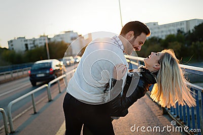 Happy young attractive couple spending time together Stock Photo