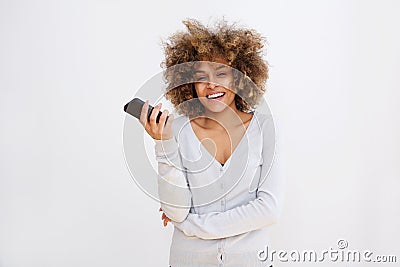 Happy young black woman with cellphone Stock Photo