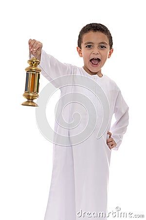 Happy Young Boy Holding Lantern Celebrating Ramadan Stock Photo