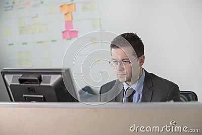 Happy young business man work in modern office.Handsome businessman in office.Real economist bussinesmen, not a model Stock Photo